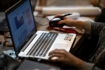 Person on a laptop using a windows 10 system